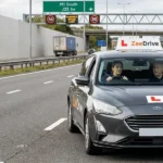 Learner driver practising motorway driving with an instructor